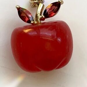 14kt and garnet with Red jade Apple charm Accents
very good condition